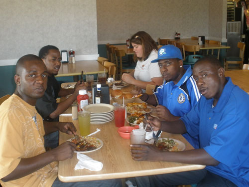 Edward Manda and friends in dallas about to watch a soccer game at the new cowboy stadium